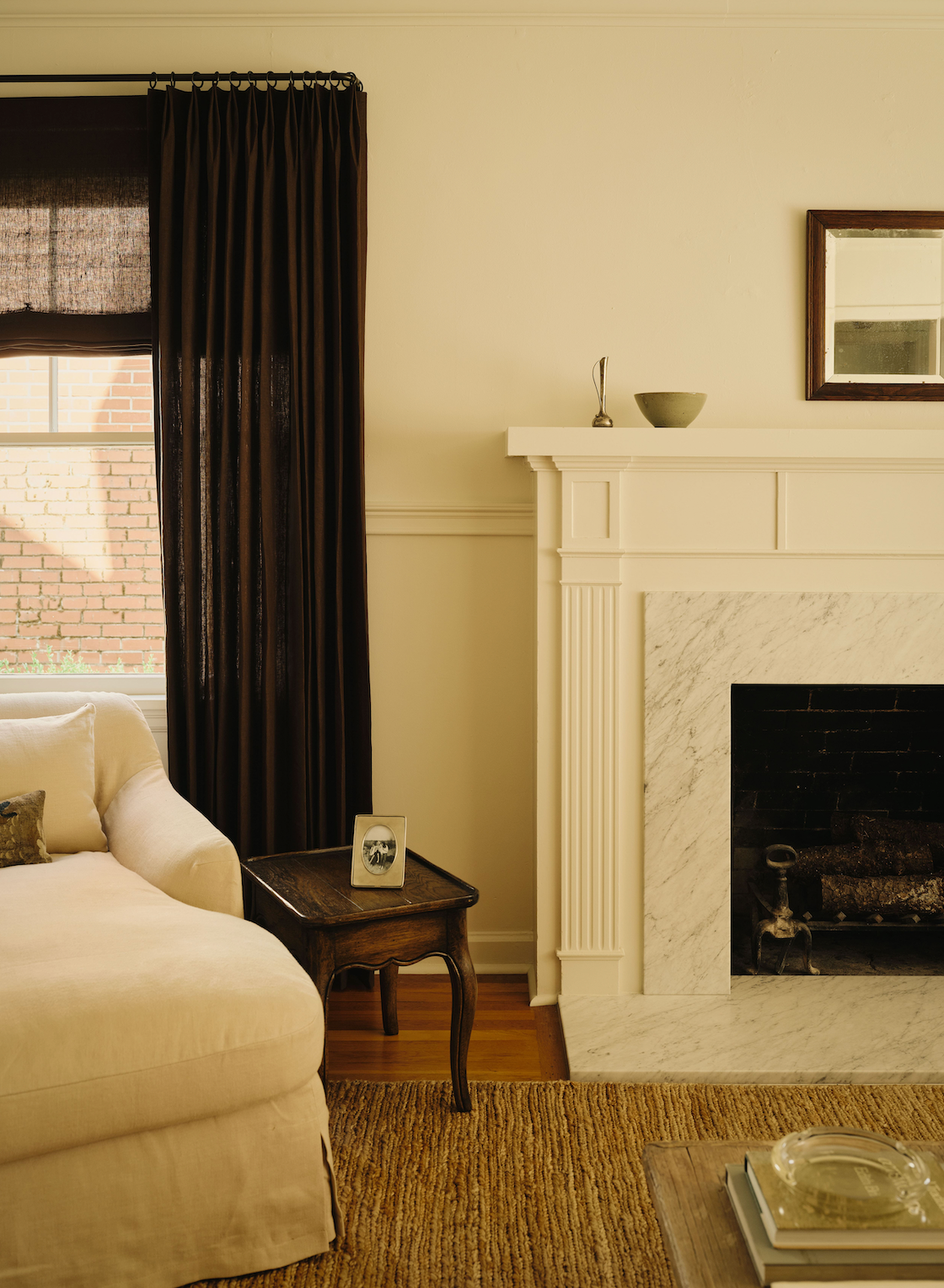 Drapery by the fireplace in a living room