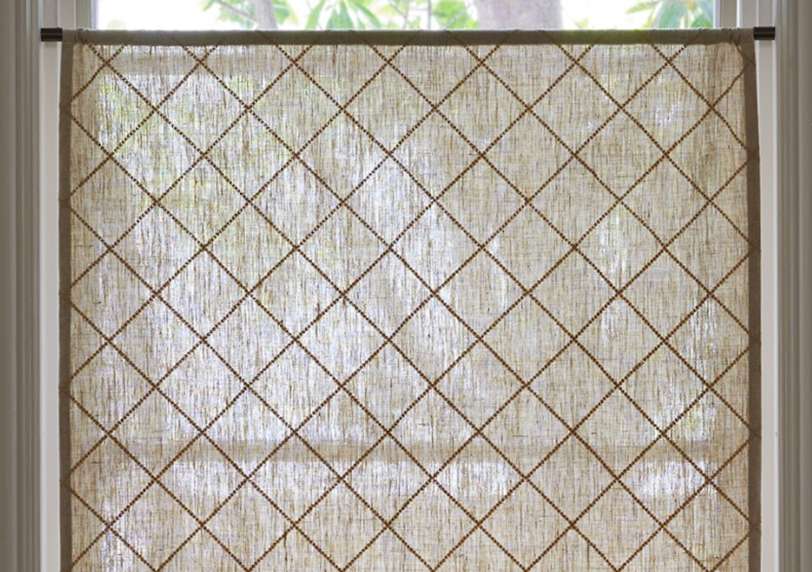 Unlined fixed curtains in light