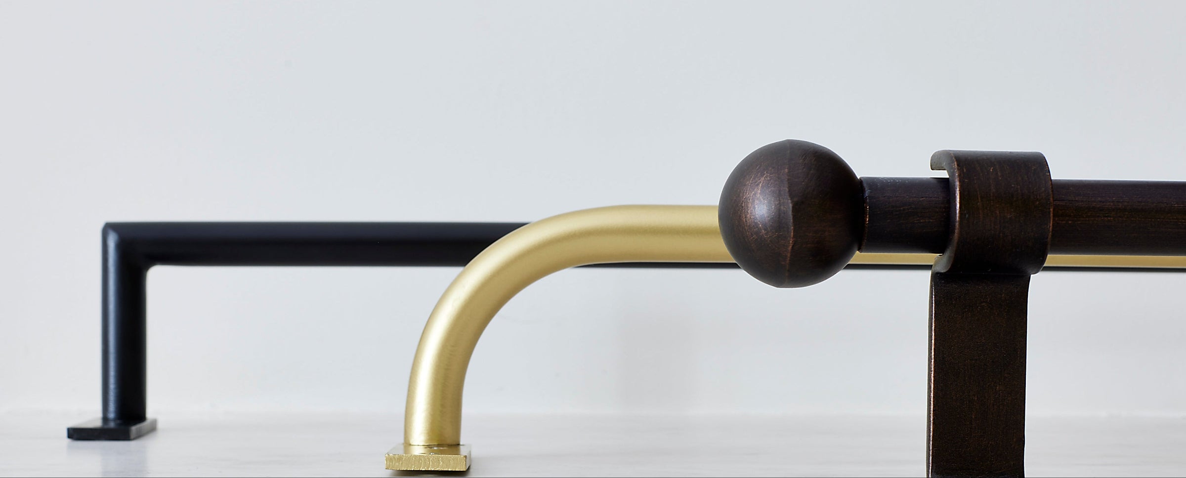 Custom Everhem brass curtain rods and hardware.