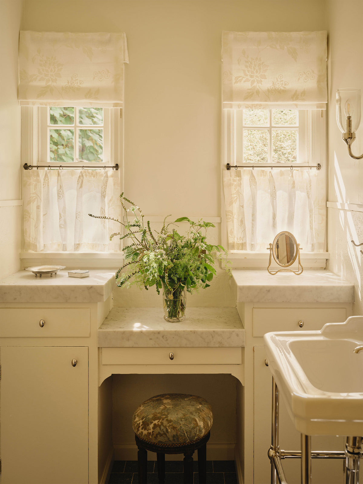 Layered Molly Kidd Studio window treatments.