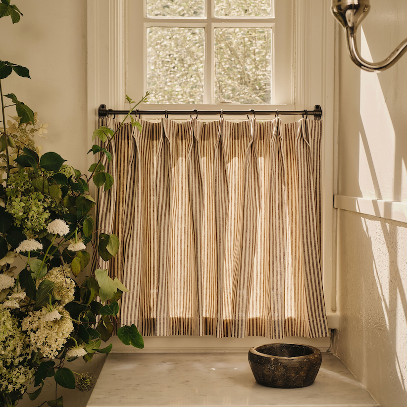 Close view of sheer floral fabric.