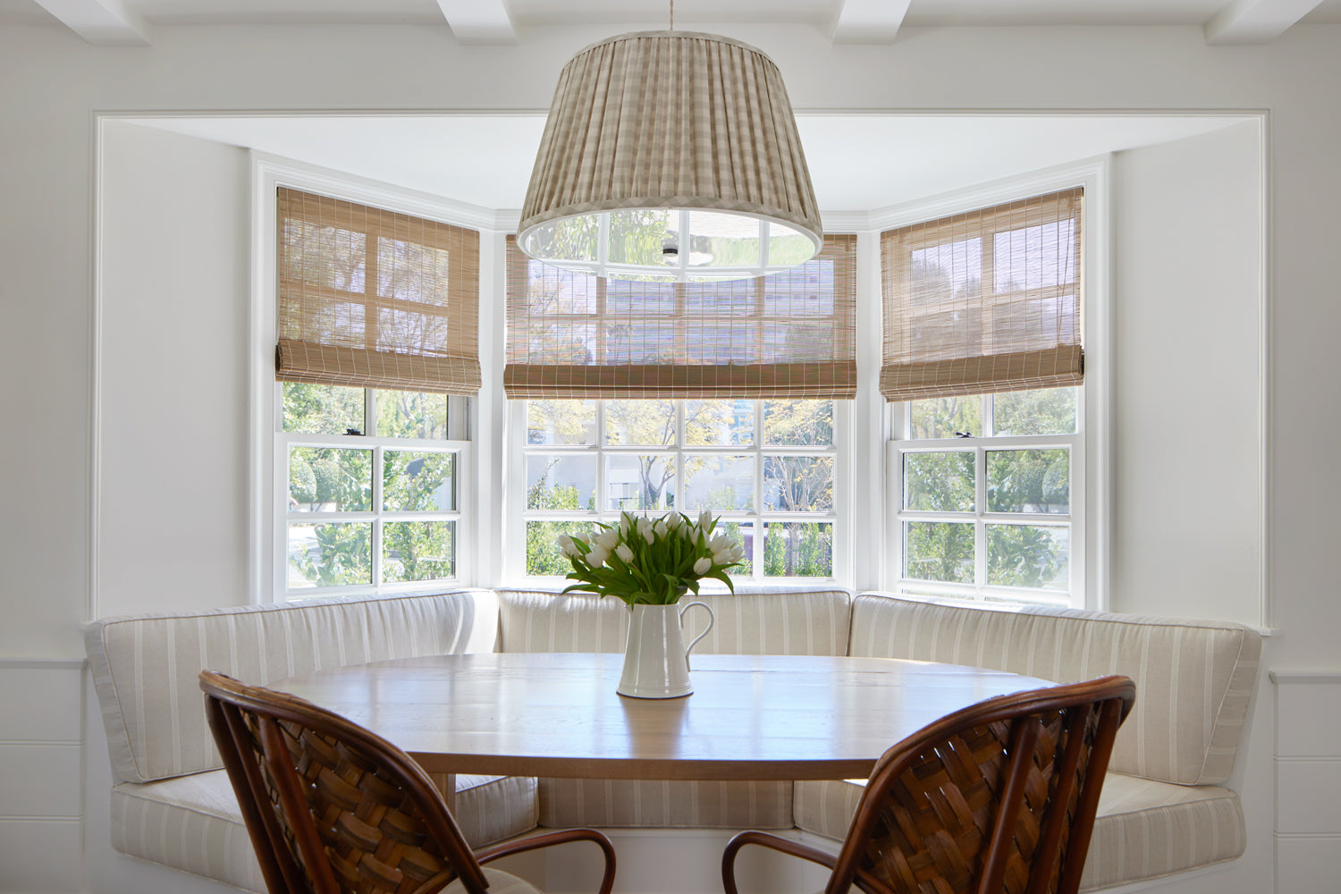 This Oak House for Everhem oak matchstick shades in a kitchen.