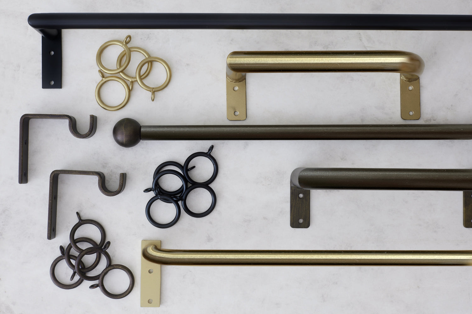 Custom Everhem brass curtain rods, rings, and brackets.