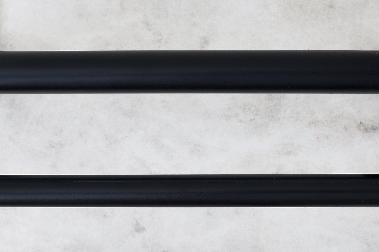 3/4 inch and 1 inch diameter rods, side by side