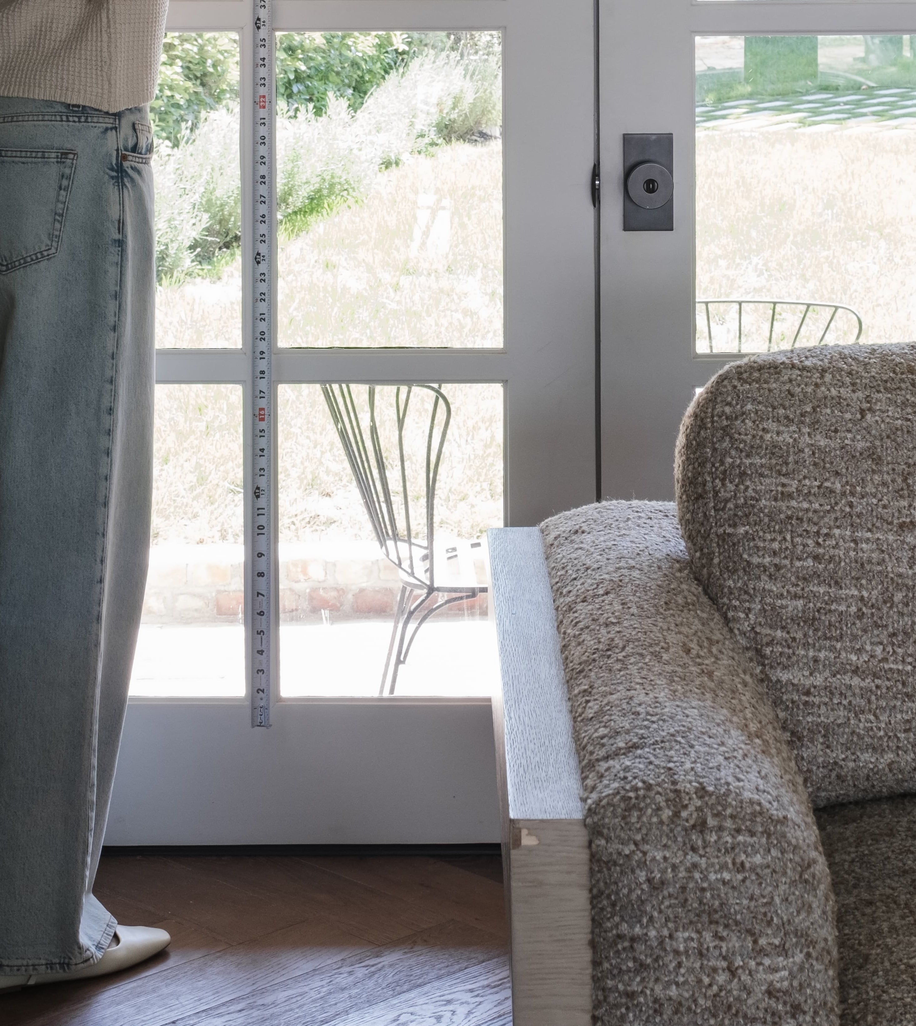 Door-mount shade with added length coverage at the bottom