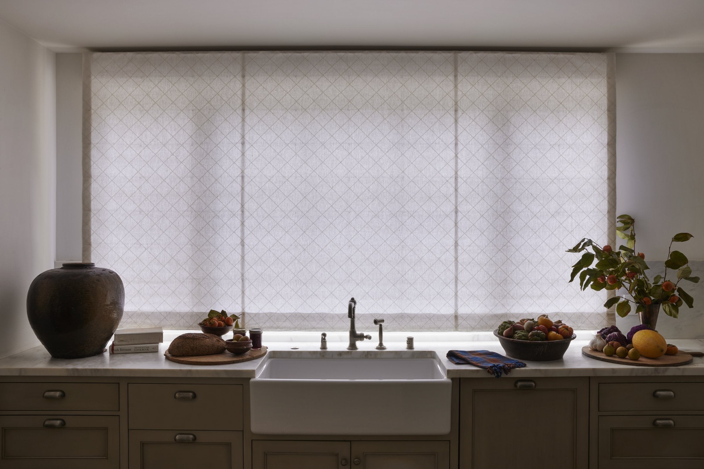 Outside-mount shade installed above the window frame